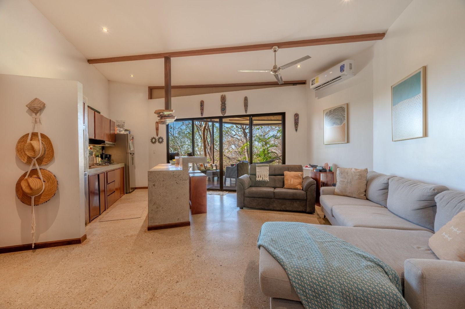 Open living room and kitchen with vaulted ceiling